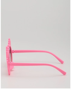 Detail view of pink pixel-style kids sunglasses with folding temples and grey lenses
