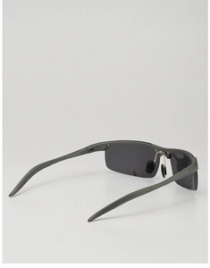 Detail view of semi-rimless polarized sunglasses with gunmetal frame and inner temple specs