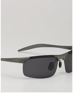 Close-up of matte grey semi-rimless polarized sunglasses showing frame details and specs