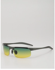 Close-up of semi-rimless sports sunglasses with yellow-green gradient lenses and matte frame