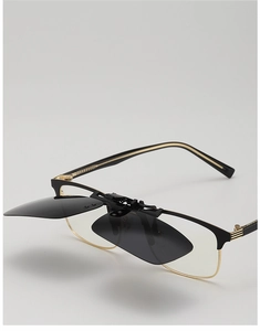 Detail of polarized clip-on sunglasses flipped up 90 degrees on semi-rimless gold metal frames