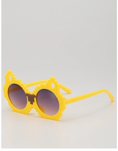 Detail of yellow pixel block sunglasses with cat ear design and gradient lenses