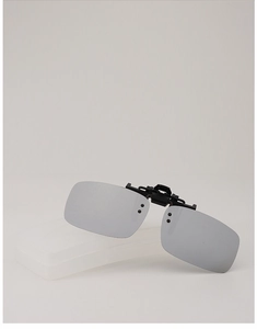 Close-up of grey polarized clip-on sunglasses with black bridge and plastic storage case