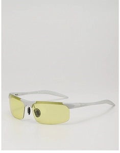 Detail of yellow night vision lenses and non-slip textured temples on sports sunglasses