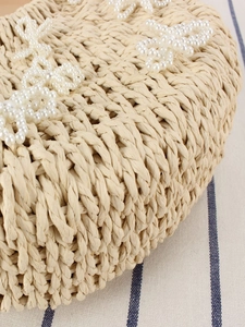 Borsa da spiaggia intrecciata a mano in corda di carta con decorazioni floreali di perle