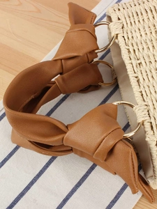 Woven straw handbag with brown PU leather knotted handle and gold metal ring details
