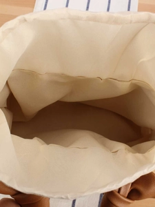 Minimalist straw PU woven tote bag interior showing spacious capacity and brown handles