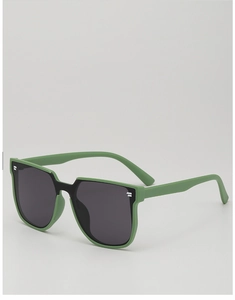 Detail of green matte square sunglasses for children with dark grey lenses and side logo