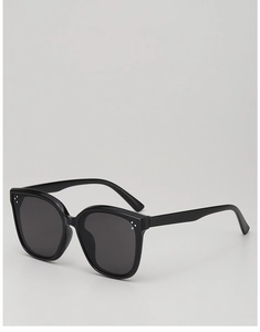 Detail of kids black square sunglasses featuring iconic silver triple-dot rivets on frame
