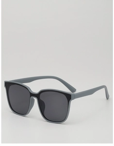 Close-up of grey matte frame and dark lenses on stylish kids sunglasses with side view