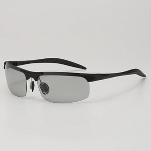 Polarized sports sunglasses with black semi-rimless frames and light grey lenses for driving