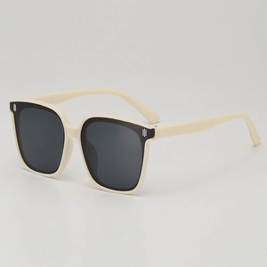 Children's square cream sunglasses with dark grey lenses and metal accents