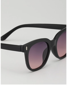 Detail of children's square sunglasses with black frames and purple gradient lenses