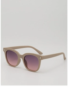 Detail of beige frame sunglasses featuring silver rivet accents and purple gradient lenses