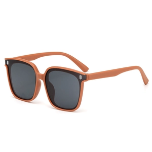 Kids square fashion sunglasses with orange frames and UV400 protective black lenses