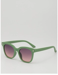 Detail of light green matte sunglasses frames with silver rivets and gradient lenses