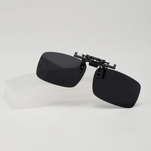 Polarized black clip-on sunglasses for prescription eyewear with a portable storage case
