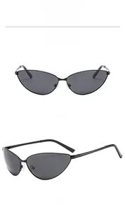 Front and side view of cat-eye sunglasses with thin black metal frames and dark grey lenses