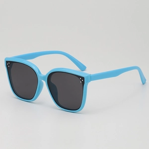 Kids light blue oversized sunglasses with dark lenses and stylish rivet decoration