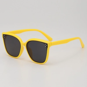 Kids vintage square yellow sunglasses with UV protection and silver rivet details