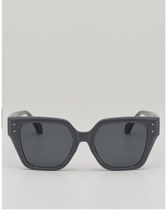 Front view of large square sunglasses with grey frames and silver double rivet details