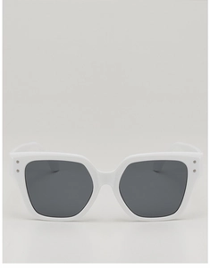 Detail of white square sunglasses frame with silver rivets and dark polarized lenses
