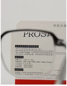 Detail view of large frame reading glasses lens focusing on memory card specifications
