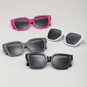 Fashionable oversized square sunglasses set in rose pink, white, gray, and black frames