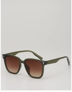 Détail de la monture de lunettes de soleil oversize vert olive avec rivets métalliques