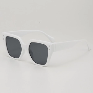 Stylish oversized polygon sunglasses with white frame and dark lenses at 45 degree angle