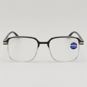 Chic anti-blue light reading glasses with stylish black and gold frames and +2.50 lenses