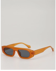 Detail of orange translucent rectangular sunglasses with dark grey lenses in a modern style