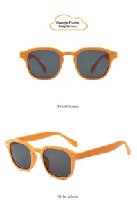Détail des lunettes de soleil carrées orange pour enfants avec verres gris et rivets