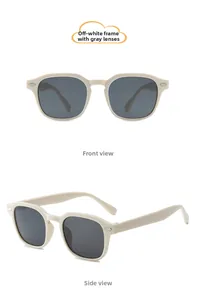 Vues de face et de côté de lunettes de soleil vintage pour enfants blanc cassé et gris