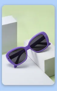 Detail of purple square oversized sunglasses for kids on a geometric display stand