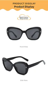 Detail view of butterfly frame sunglasses with silver diamond accent and grey lenses