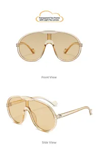Front and side view of kids oversized shield sunglasses in transparent tea brown finish