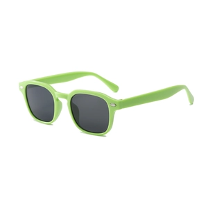 Lunettes de soleil rétro vert néon pour enfants avec verres foncés et rivets argentés
