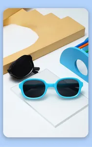 Detail of colorful foldable kids sunglasses with UV protection in a playful scene