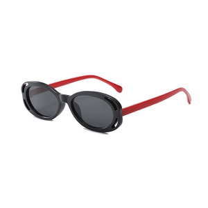 Lunettes de soleil ovales noir et rouge pour enfants avec monture ajourée tendance