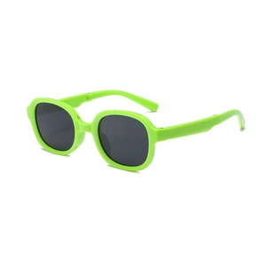 Foldable children's sunglasses with green frame and dark UV protective lenses
