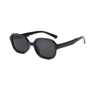 Classic foldable children's sunglasses with black oval frames and UV protection