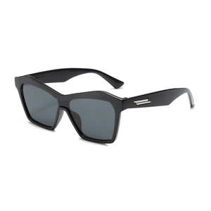 Hip-hop style kids sunglasses with black chunky geometric frames and dark lenses