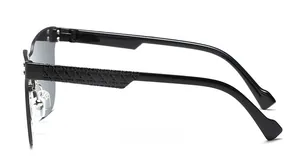 Detail of child rimless sunglasses showing geometric textured temples and silver hinges