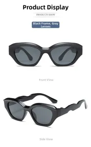 Detail view of wave-shaped temples and dark grey lenses on black kids sunglasses