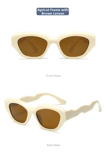 Detail view of wavy beige frames and brown lenses of high-quality kids' sunglasses