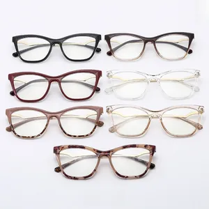 Flat lay of retro TR90 cat eye glasses frames in seven diverse colors and patterns