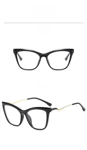 Detail view showing black TR90 cat-eye frame and gold wavy metal temples from two angles