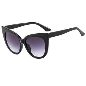 Retro oversized cat-eye sunglasses with black glitter frames and purple gradient lenses