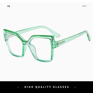 Close-up of green transparent cat-eye frame glasses showing metal hinge detail and model W88132